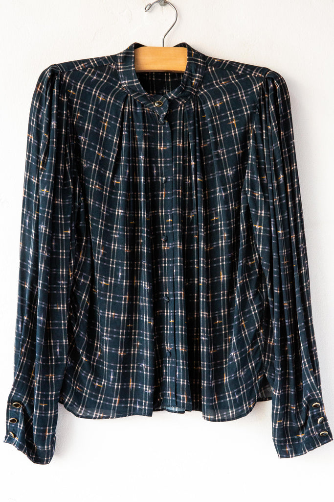 Esperanzo Checks Top